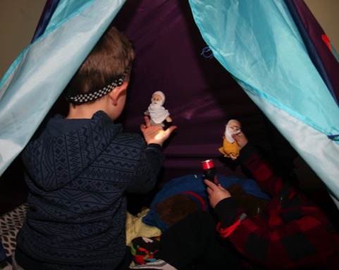 Jack and Owen playing in their tent with tent