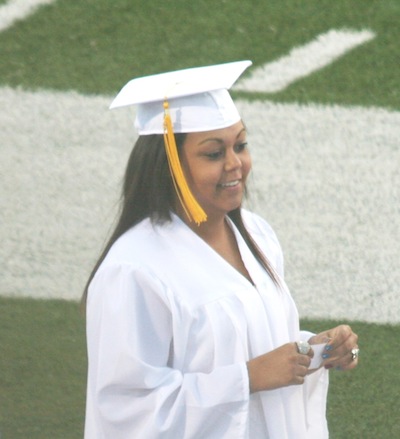 Ayanna walking across the field