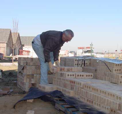 Al stacking more bricks