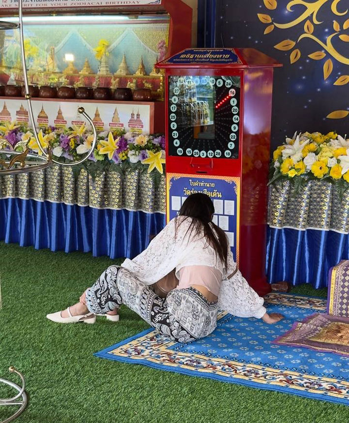 This is a behind the scene picture of me trying to read from the fortune-telling machine