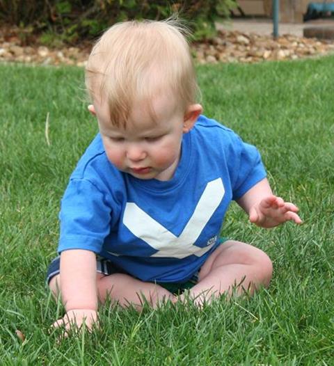 Owen playing in the grass
