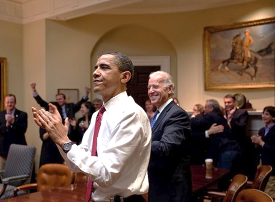 Barack Obama reacts to the passing of healthcare reform.