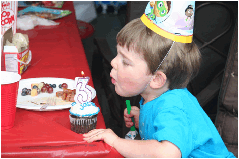 Jack blowing out his candles