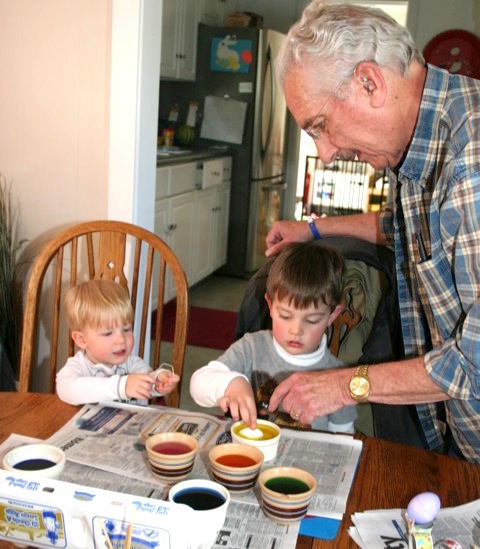 Then it was their turn.  Owen is telling Jack to put the egg on the holder to dip it.