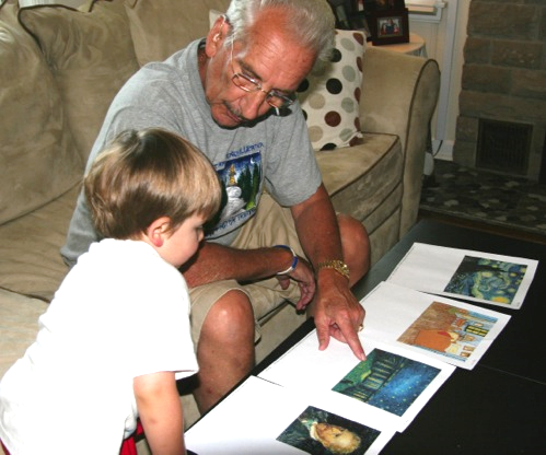 Al and Jack looking at prints