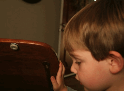 Jack peeking into his desk