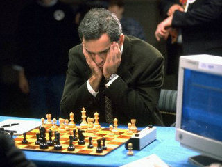 A meditative moment of an adult chess master