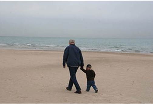 Al and Jack walking on the beach