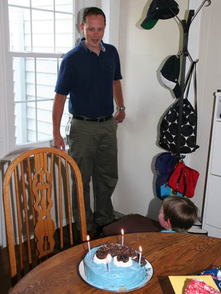 Jack and Owen were hiding under the table <br>when their Daddy came home to their surprise birthday cake.