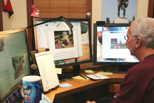 Al at his desk