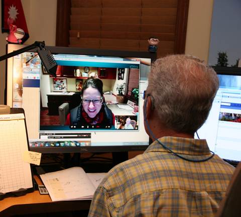 Al talking to China on Skype