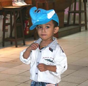 Burmese boy in blue hat