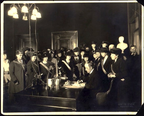 President Wilson signing the 19th Amendment