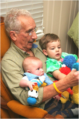 Description: Al sitting with Jack and Owen