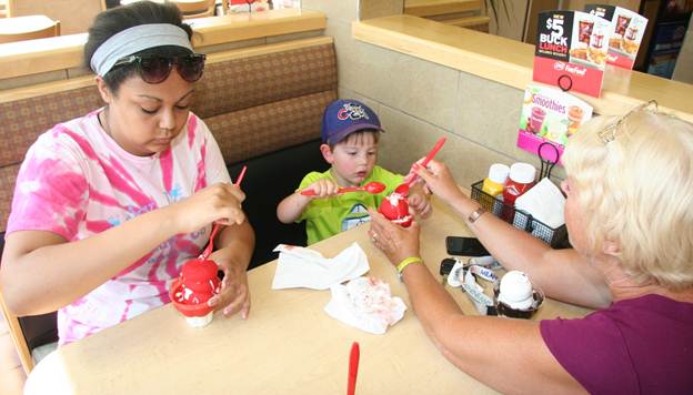  Jack isn't sure that Ya-Ya won't damage his Elmo treat.  So he watches Ya-Ya carefully.