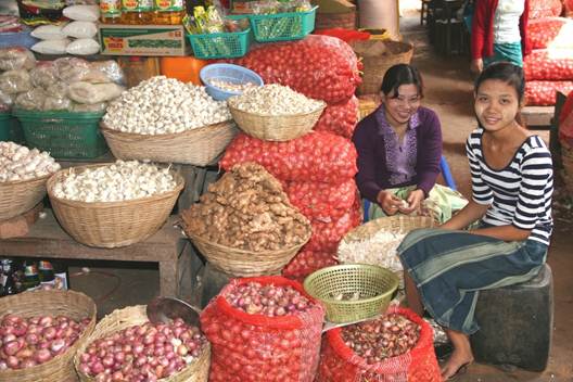 Girls selling produce