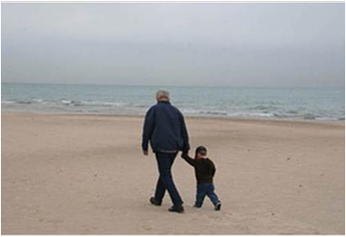 Description: Al and Jack walking on the beach
