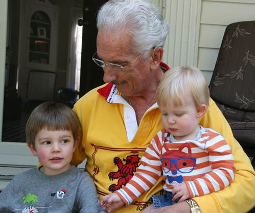 Al on porch with Jack and Owen